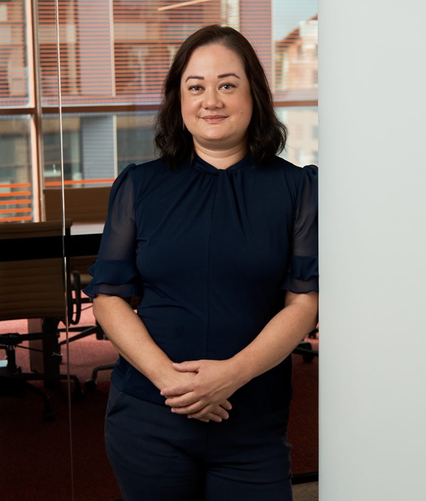 A professional portrait of Catherine Tan