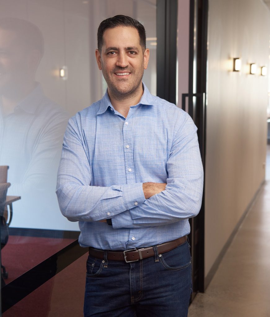 A professional portrait of Peter Doueihi