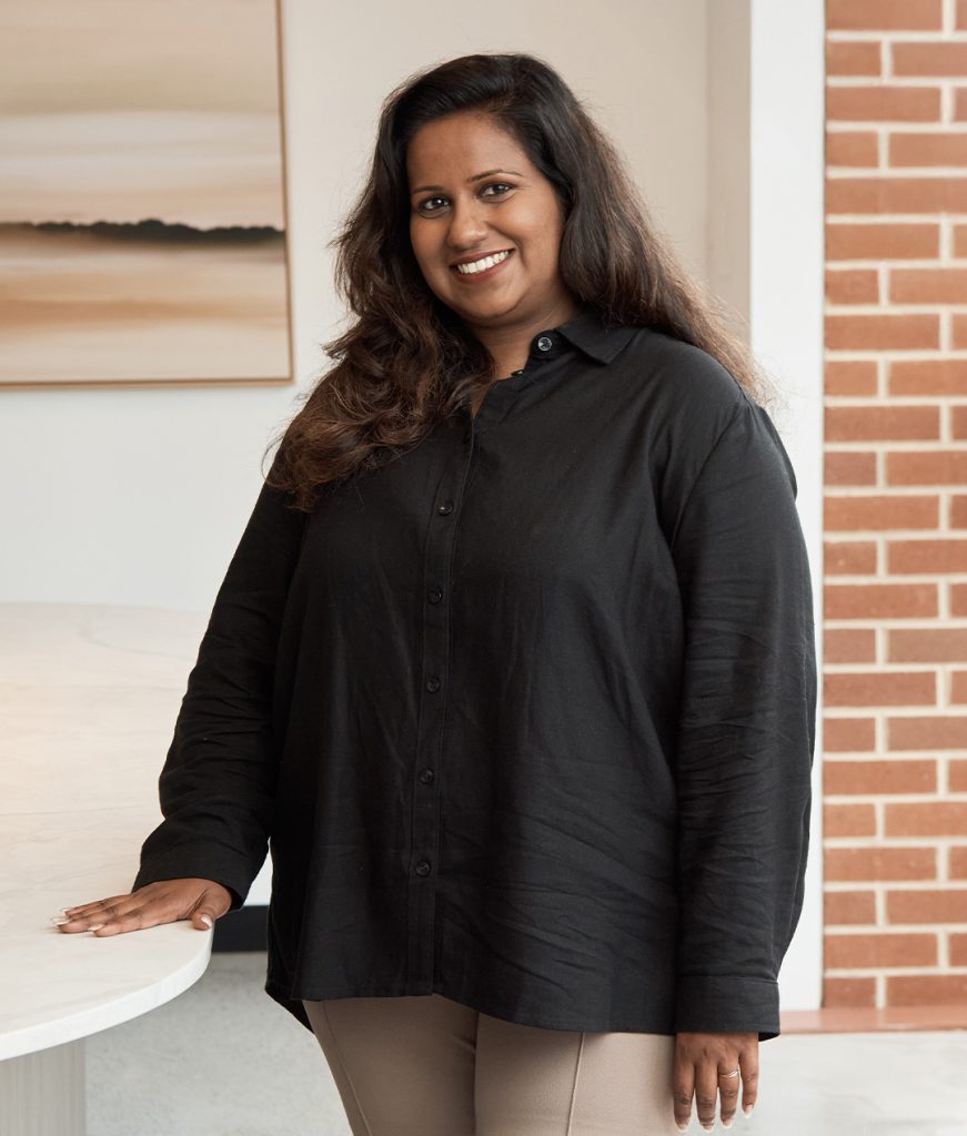 A professional portrait of Rosh De Silva
